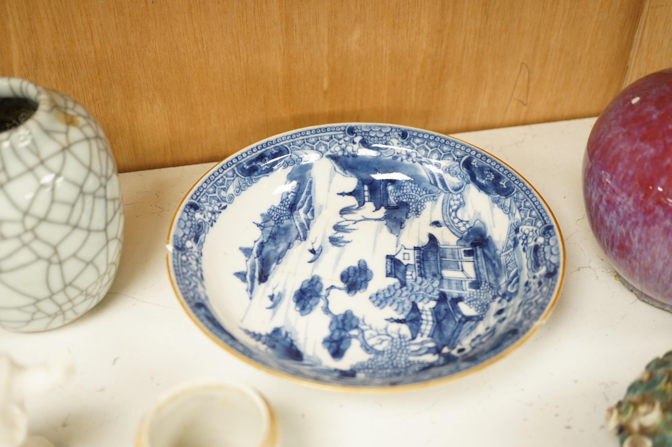 A group of Chinese and Japanese ceramics. Tallest 18cm